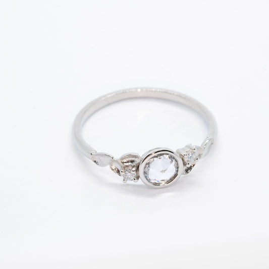 Bague Anne or 18K et saphir incolore