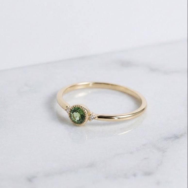 Bague de fiançailles or jaune 18k et saphir bleu-vert
