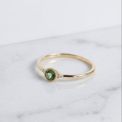 Bague de fiançailles or jaune 18k et saphir bleu-vert