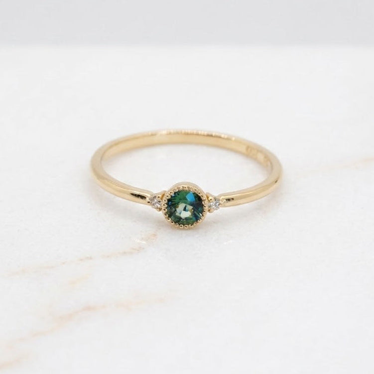 Bague de fiançailles or jaune 18k et saphir bleu-vert