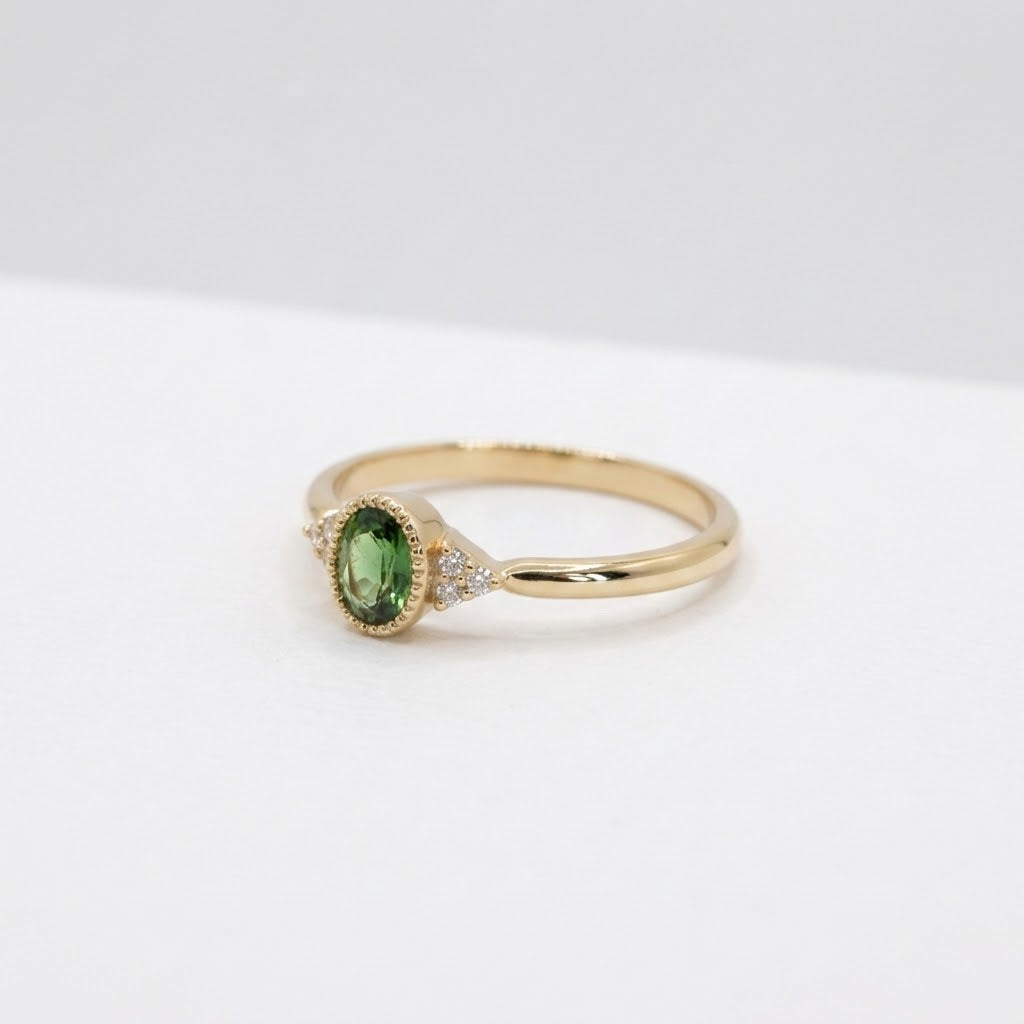 Bague de fiançailles or 18k saphir vert et diamants