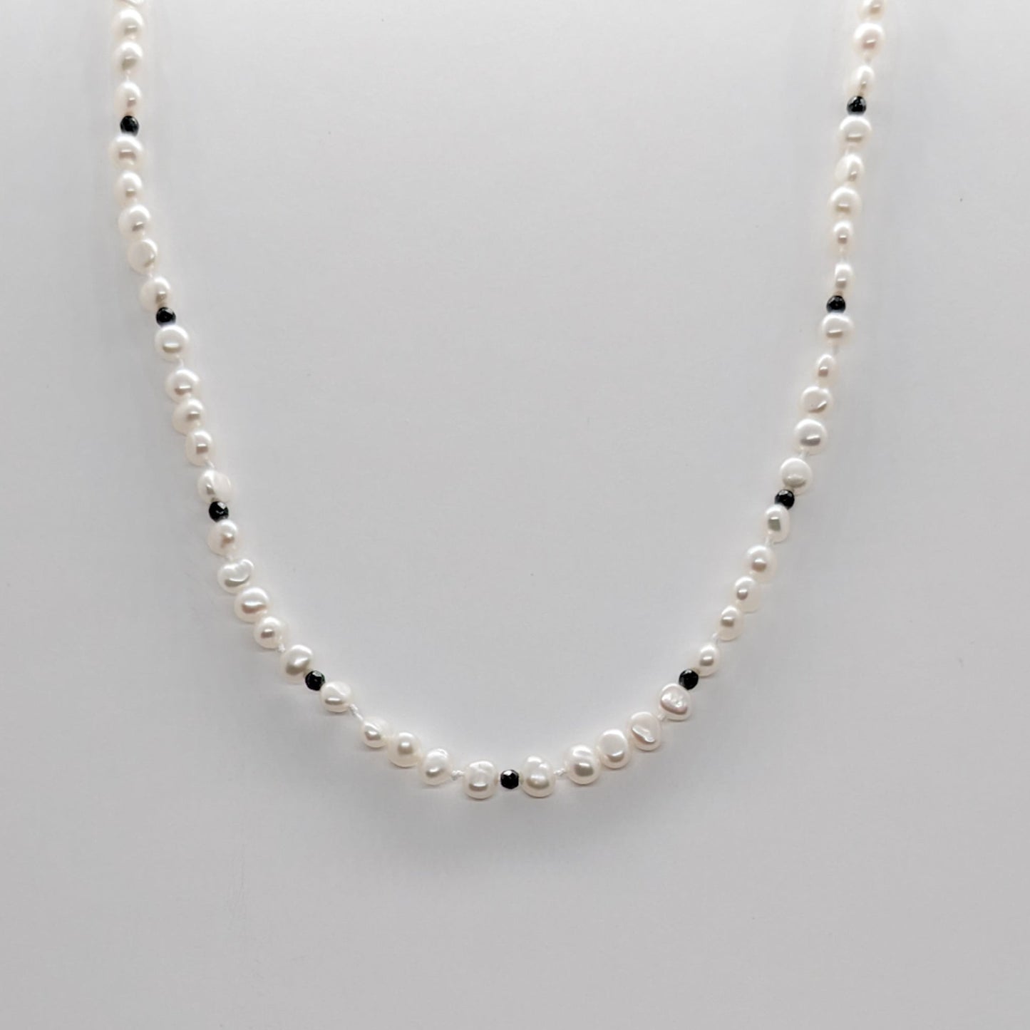 Necklace of keshi pearls and hematite pearls