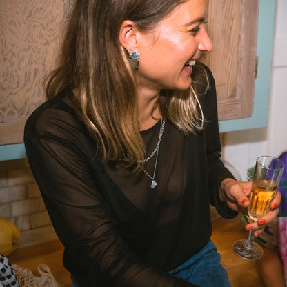 Boucles d'oreilles numero neuf portées